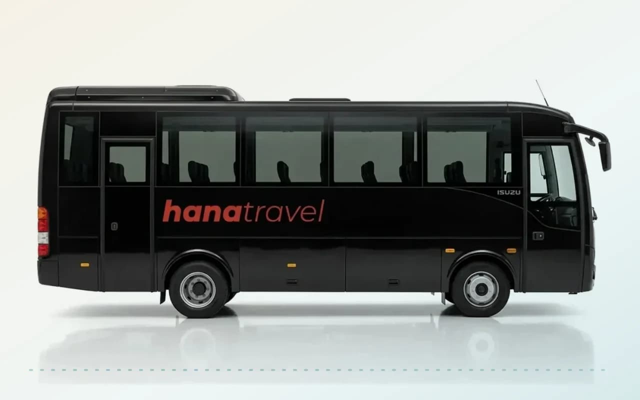 Side view of a black Isuzu Novo Ultra on a white background for Antalya Airport transfers.